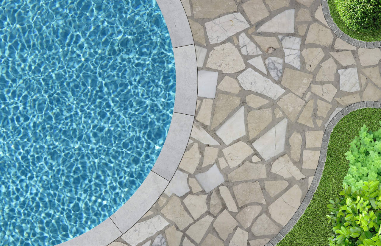 Flagstone patio next to pool